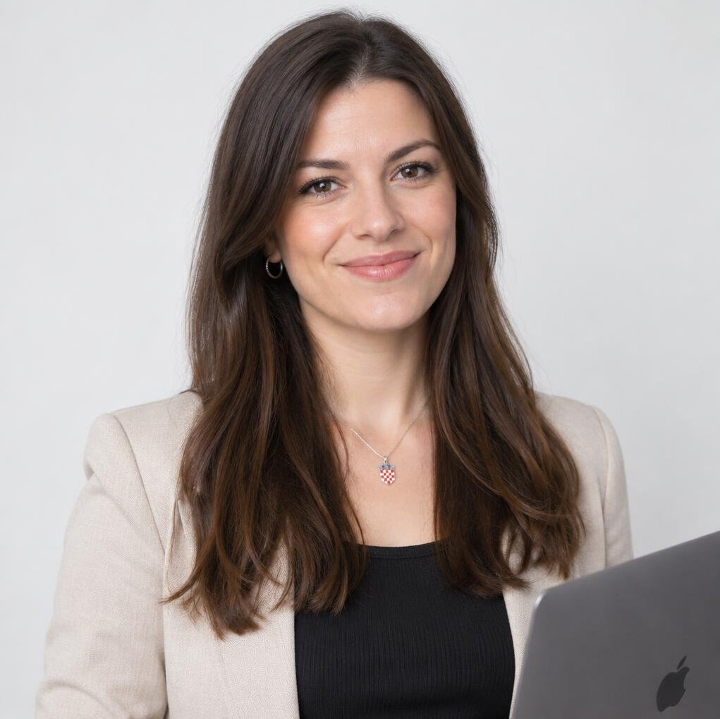 Croatian woman software developer smiling in modern office